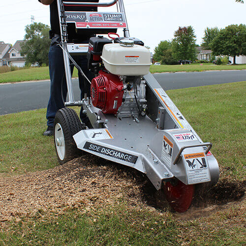 Operator using a Dosko Stump Grinder