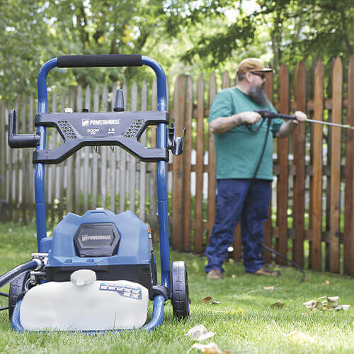 Homeowner using a Powerhorse Pressure Washer